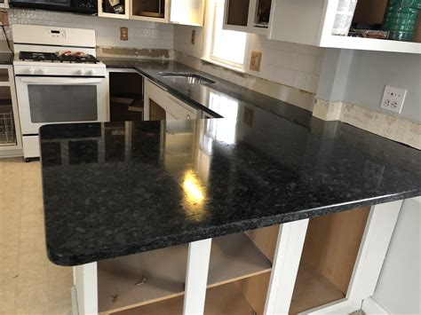 steel gray granite with gray cabinets|metal grey granite.